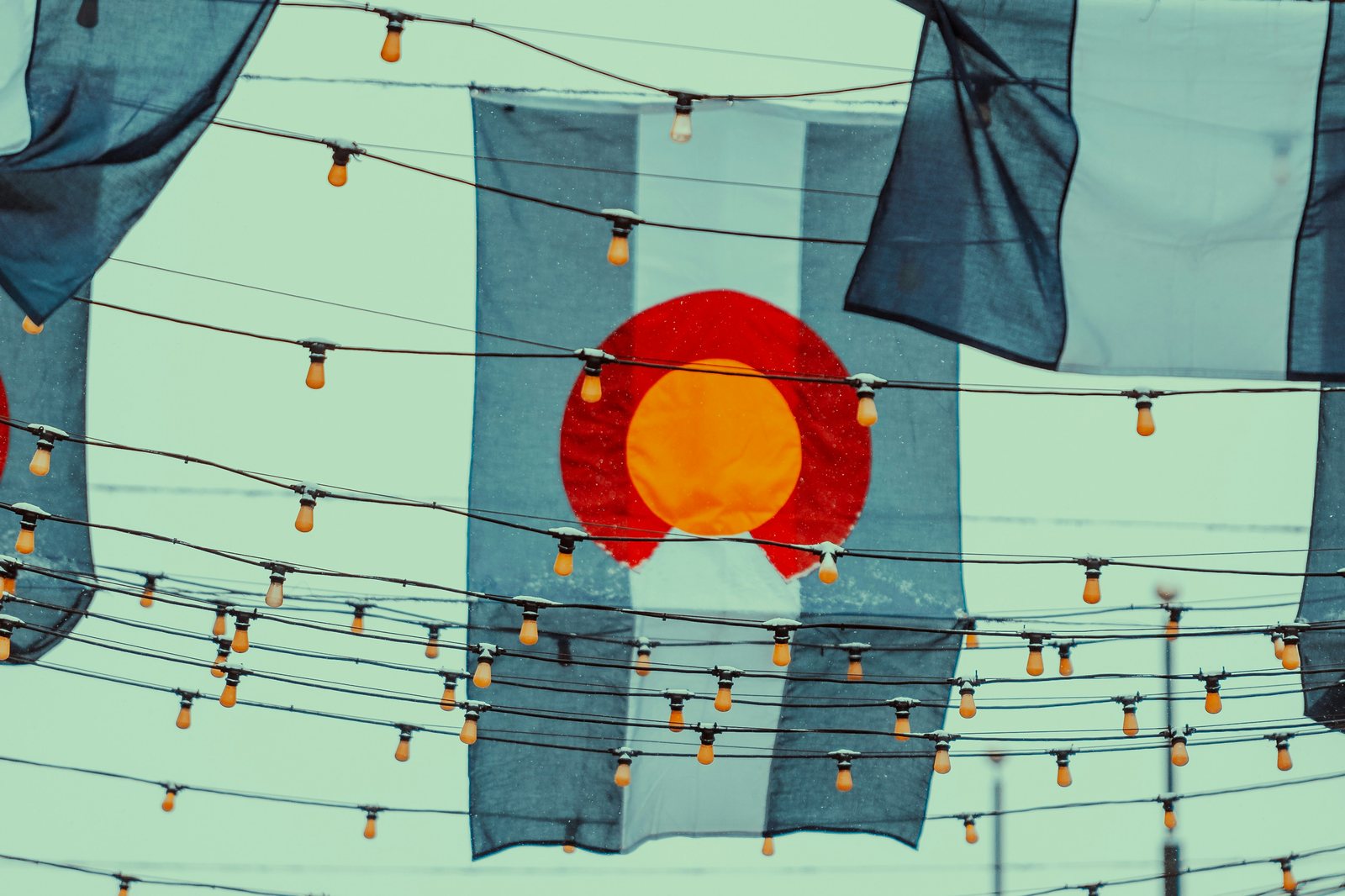 Colorado flags strung above a street